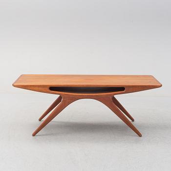 A 1950s teak veneered 'Smile' coffee table by Johannes Andersen for CFC Silkeborg, Denmark.