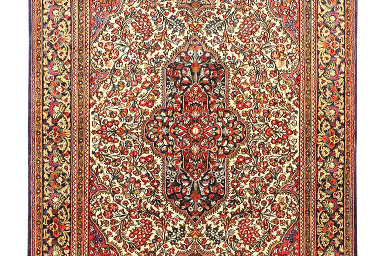 A Ghom rug, c. 202 x 137 cm.