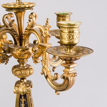 A pair of bronze candelabra from the latter half of the 19th Century.