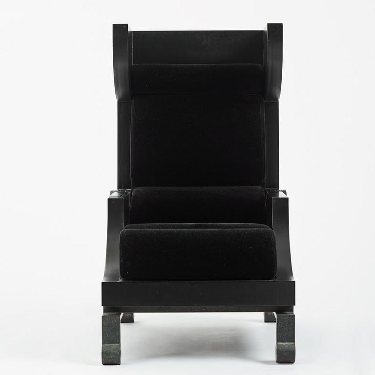 Alexander H Damsbo & Henrik Ingemann Nielsen, a "HC-Andersen Chair" armchair/table, ed. 3/49, Källemo, post 2005.