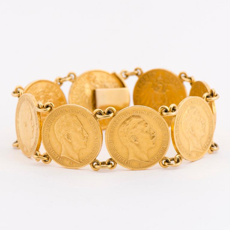 A BRACELET, gold coins, setting 18K gold.