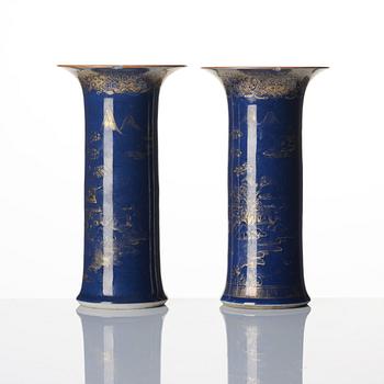 A pair of powder blue and gold 'trumpet' vases, Qing dynasty, 18th century.