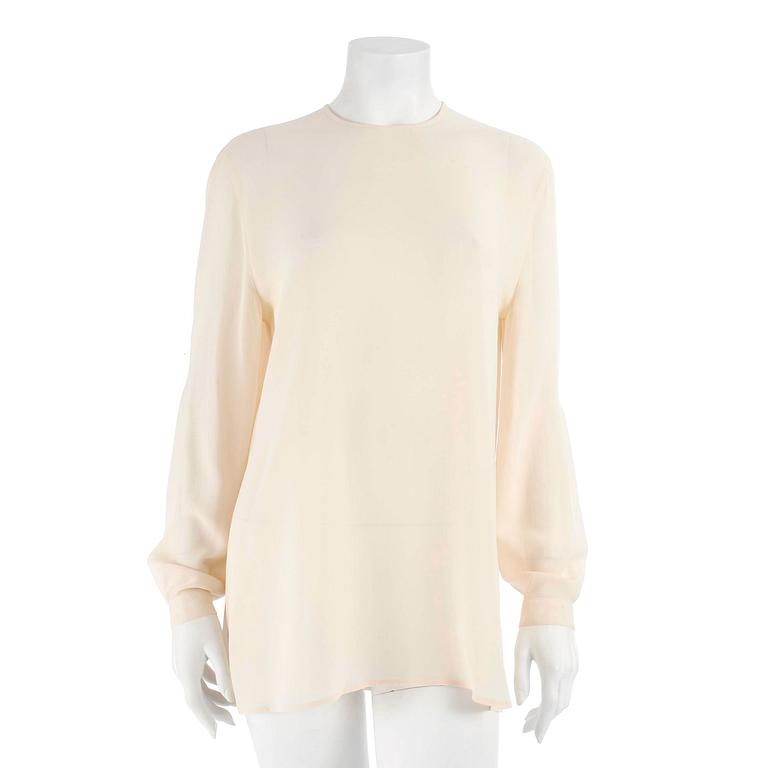 GIORGIO ARMANI, a créme colored silk blouse, size 42.