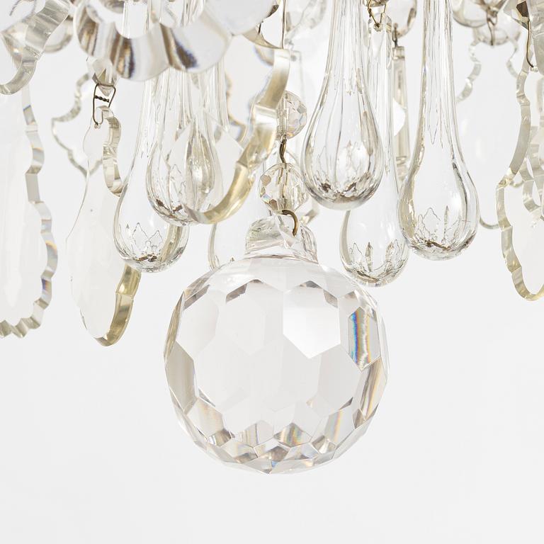 A six-branch rococ-style chandelier, first part 20th century.