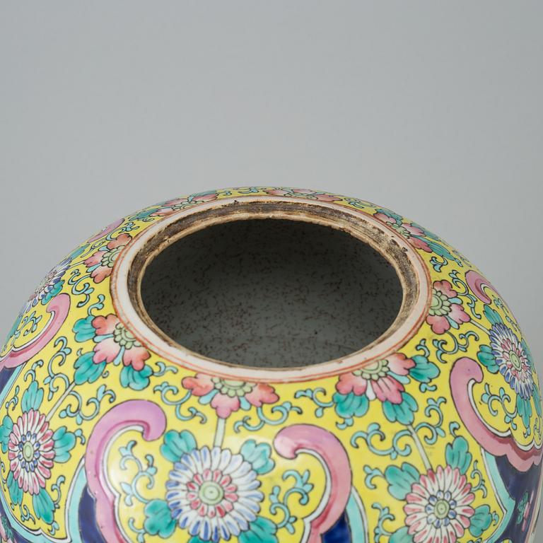 A 20th century famille rose pot with cover.