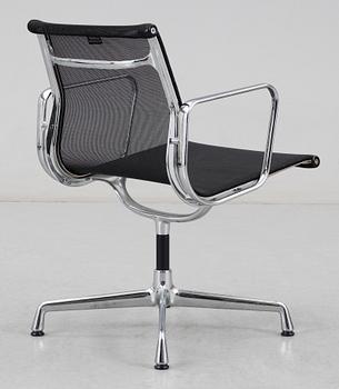 A set of six Charles and Ray Eames 'Aluminium Group chairs EA 108' by Vitra.