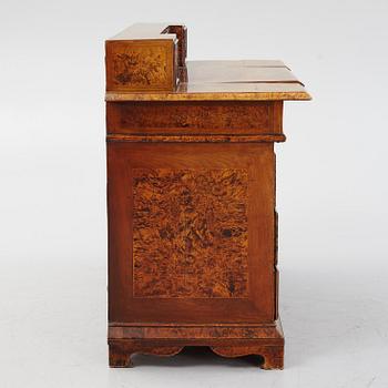 A Swedish late Baroque alder-veneered 'knee-hole' writing desk, first part of the 18th century.