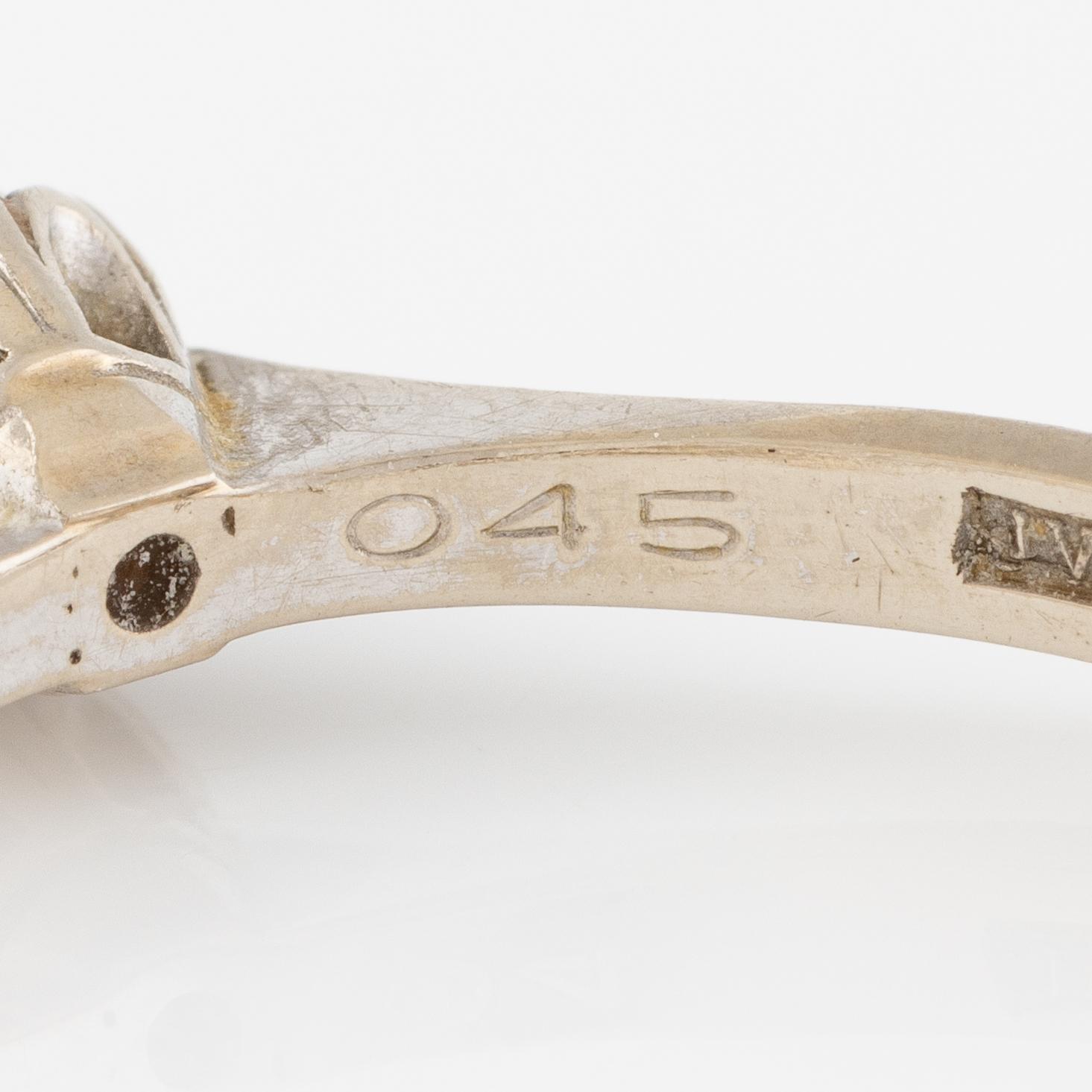 Ring, enstensring, 18K vitguld med briljantslipad diamant.