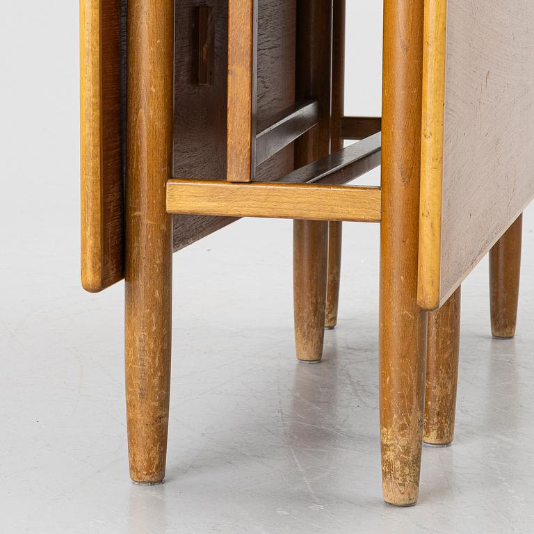 A mid20th century gate-leg table.