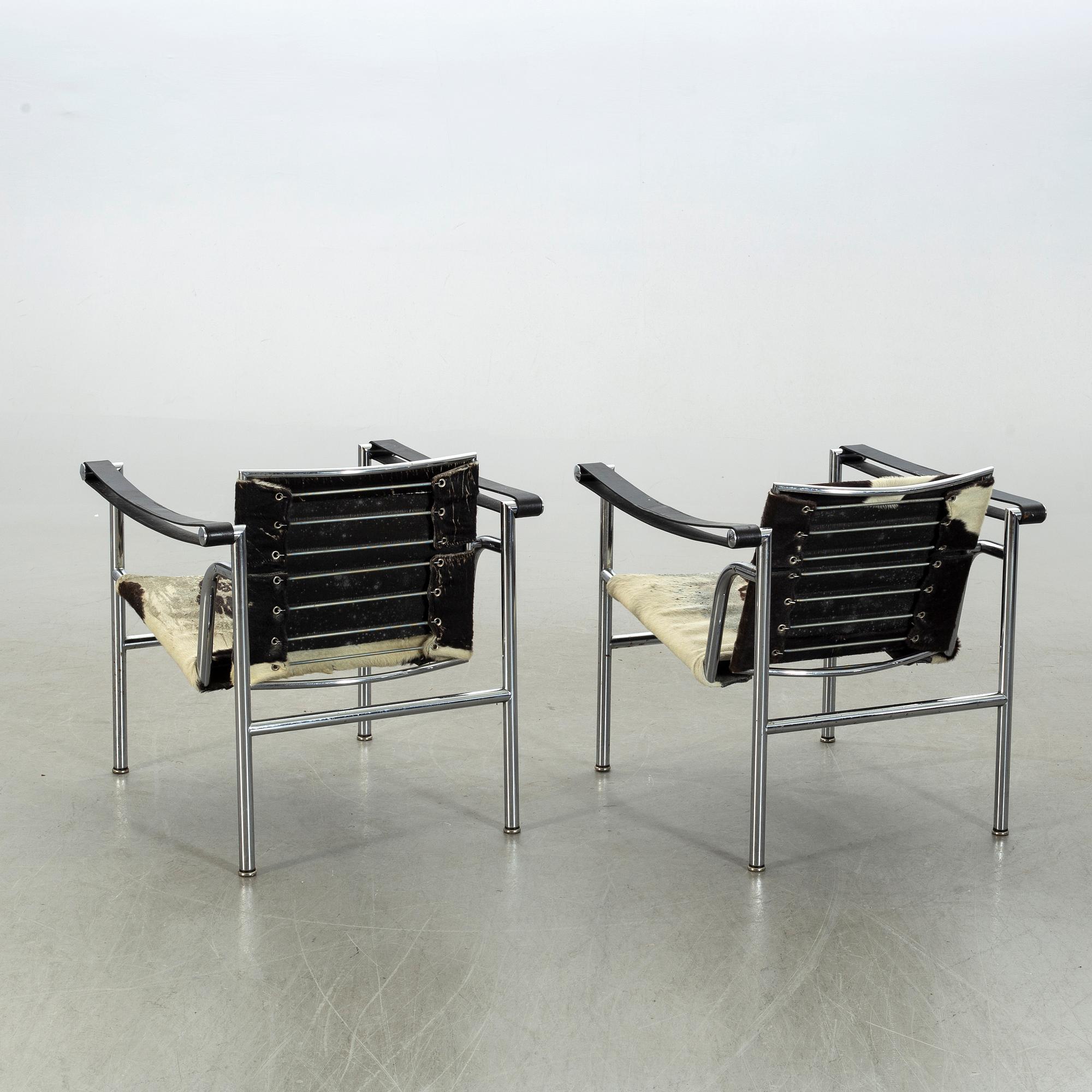 LE CORBUSIER, a pair of armchairs, "LC 1", Cassina.