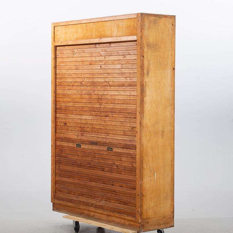 a roll top cabinet, mid 20th century.