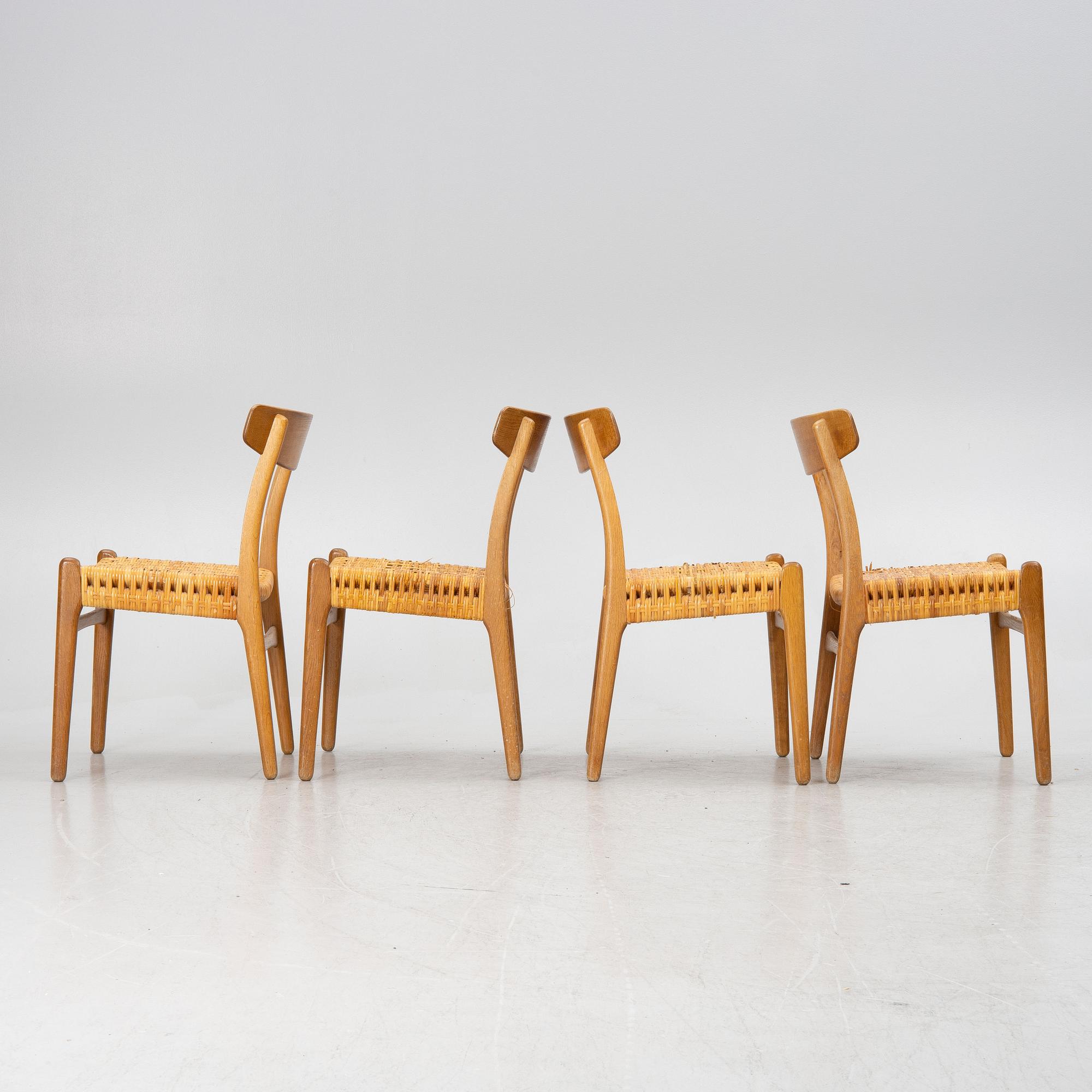 Hans J.Wegner, four dining chairs, model "CH-23",, Denmark, second half of the 20th century.