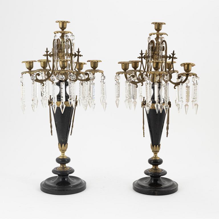 A pair of stone and gilt brass six-light candelabra, circa 1900.