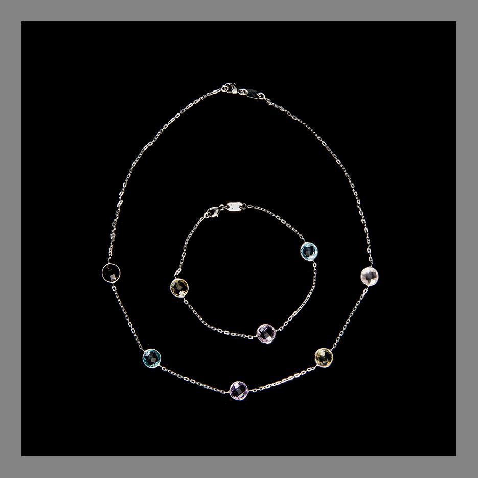 A NECKLACE AND A BRACELET, 18K white gold, topaz, quartz. Weight totally c. 8,3 g.