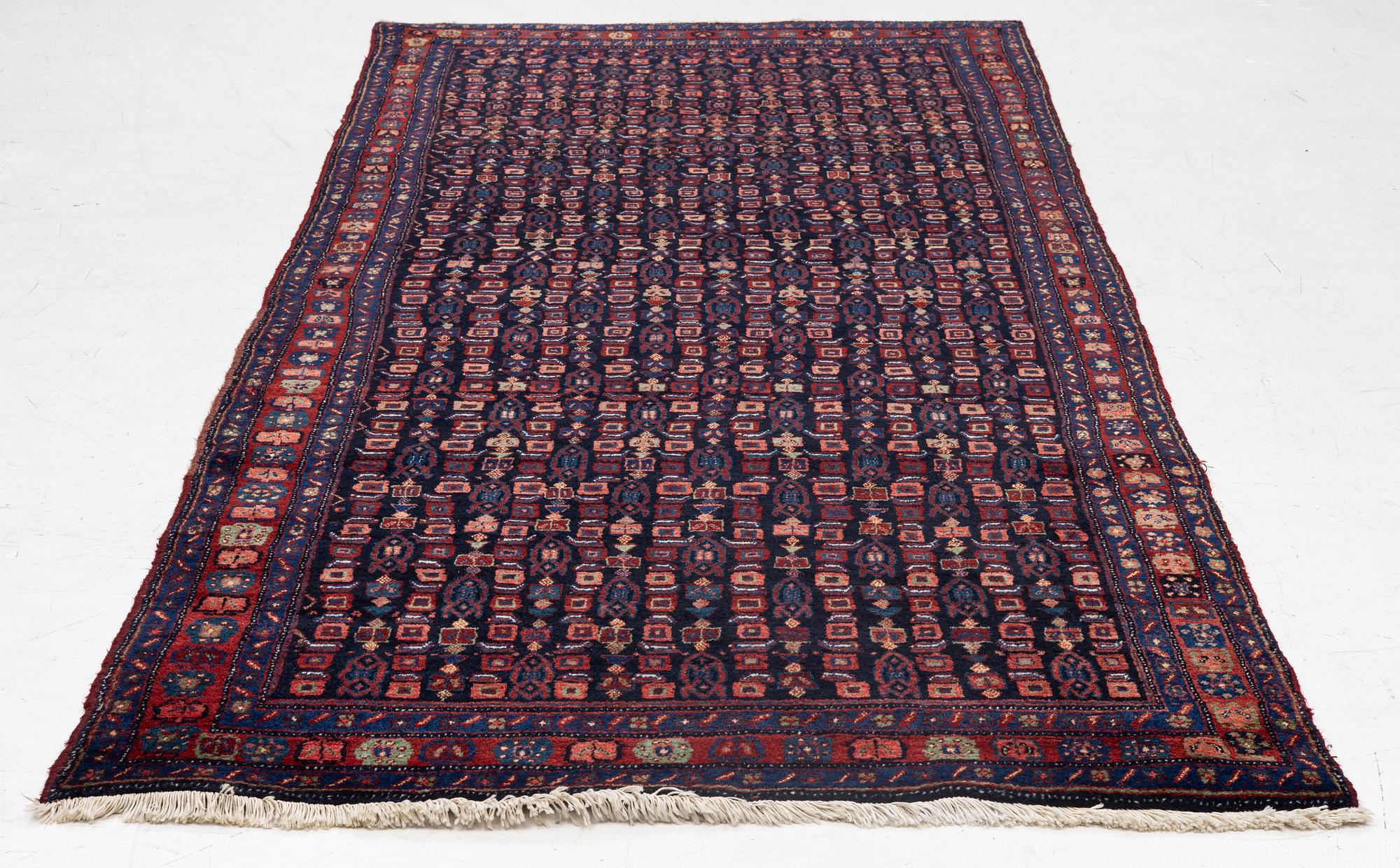 A semi-antique Bidjar carpet, c. 310 x 145 cm.