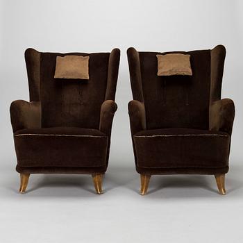A pair of armchairs, mid-20th century.