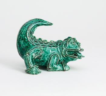 A Wilhelm Kåge stoneware figure of a dragon puppy, Gustavsberg circa 1940.