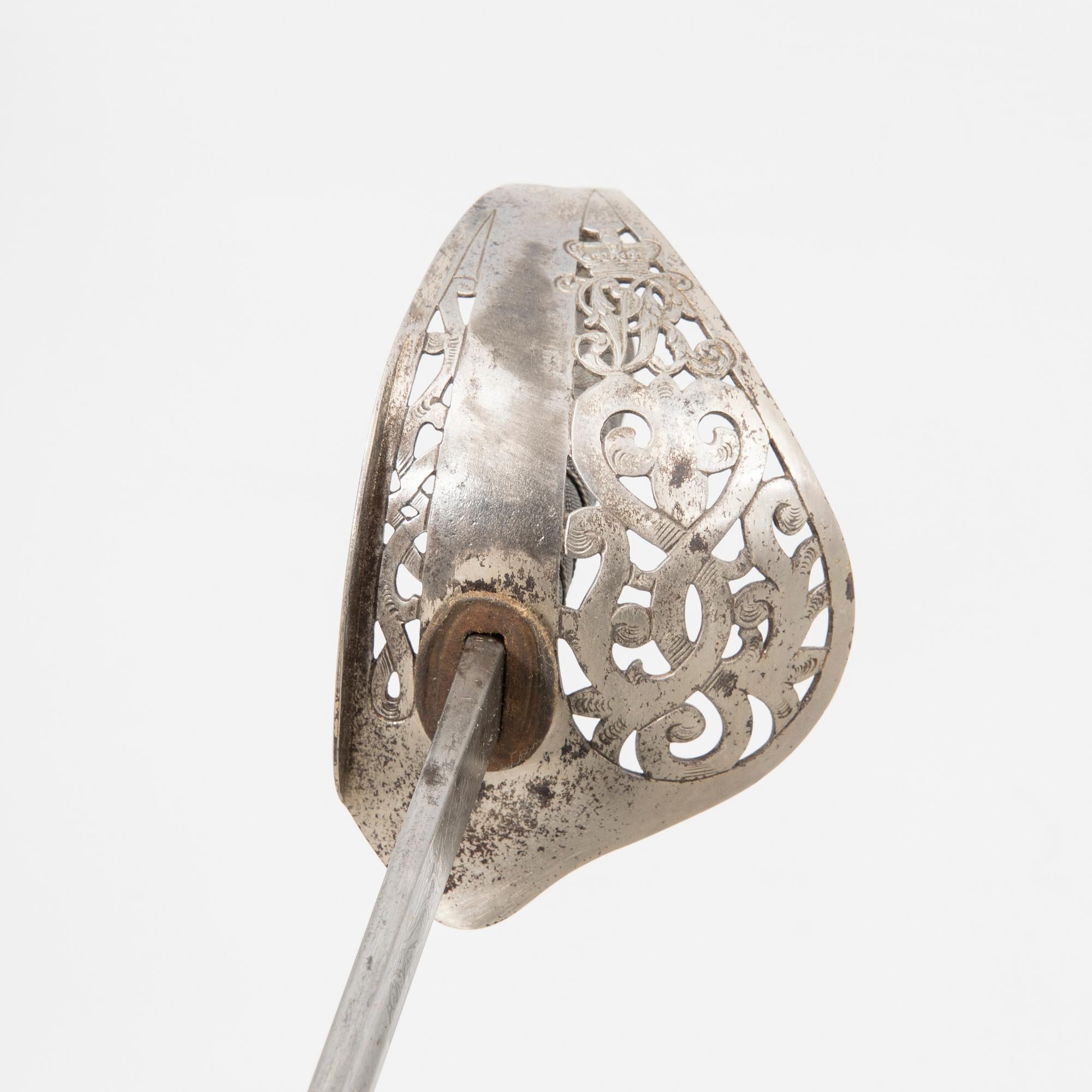 A British sabre 1897 pattern, with scabbard.