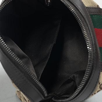 Gucci, bag, "Messenger bag" and toiletry bag.