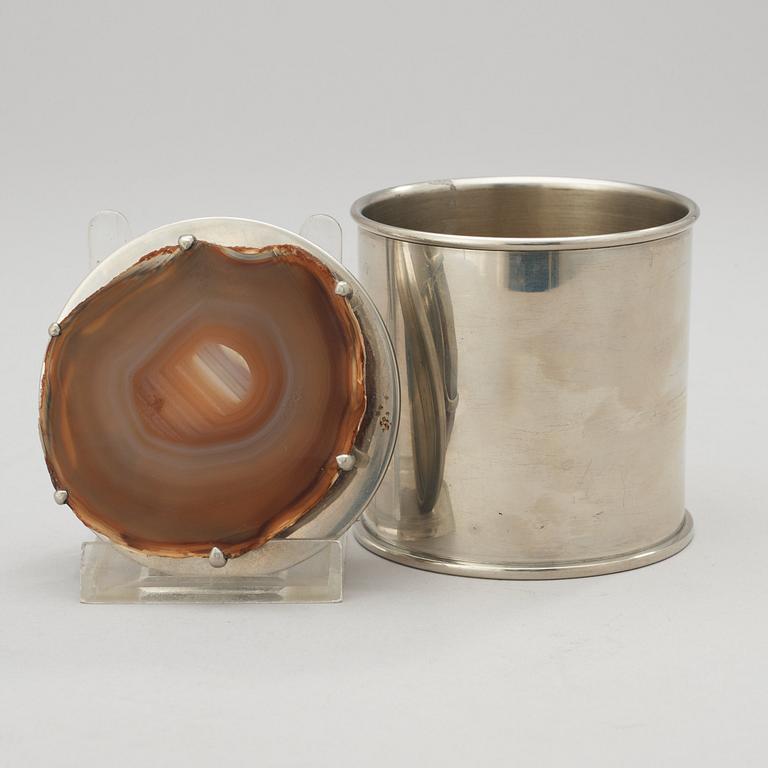 An Estrid Ericson pewter jar, the cover with agate finial, Svenskt Tenn, Stockholm 1928.