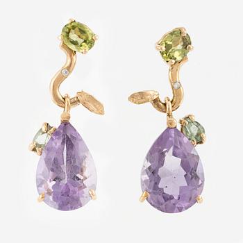 Earrings with drop-shaped faceted amethysts, peridot, and small diamonds.