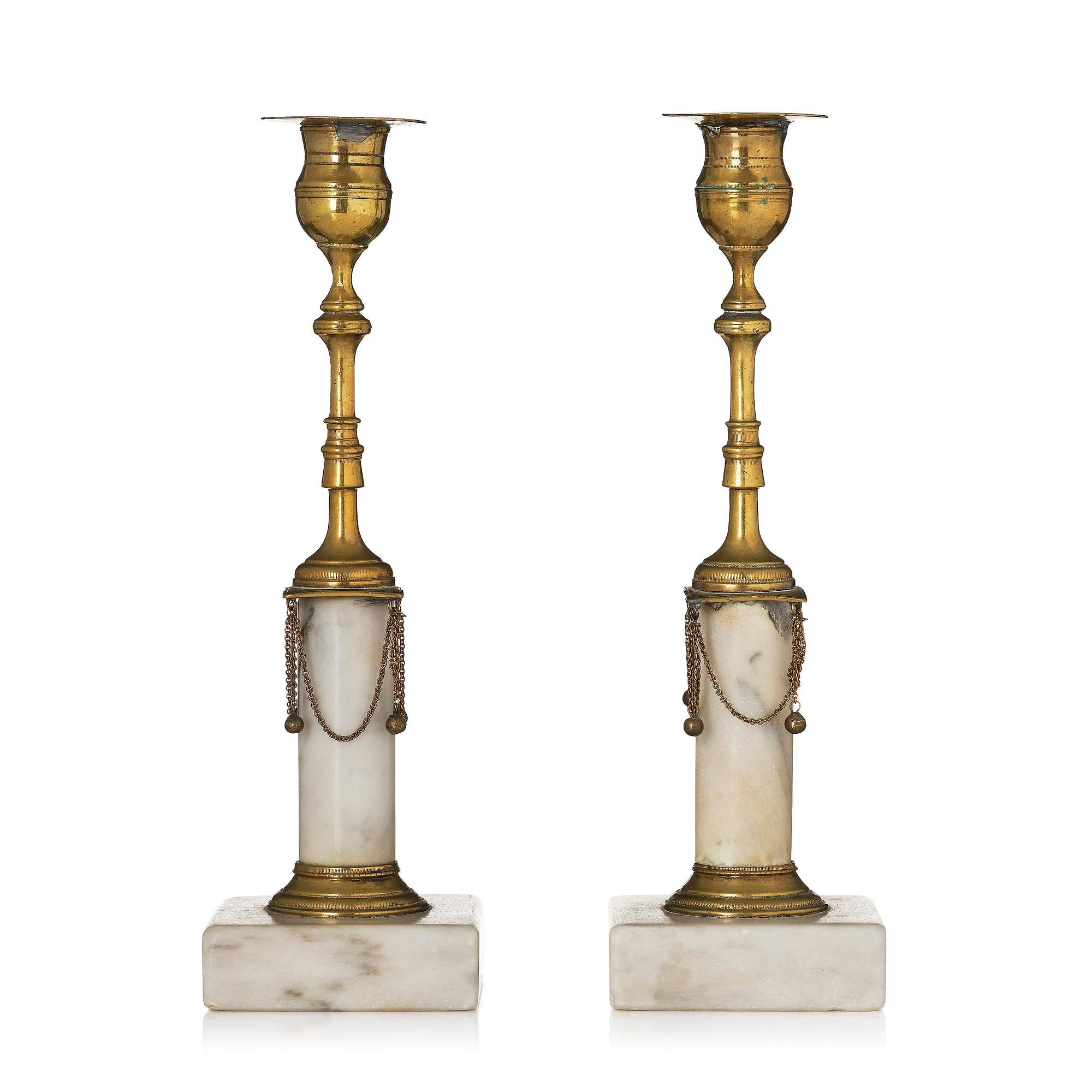 A pair of late Gustavian marble and gilt brass candlesticks, late 18th century.