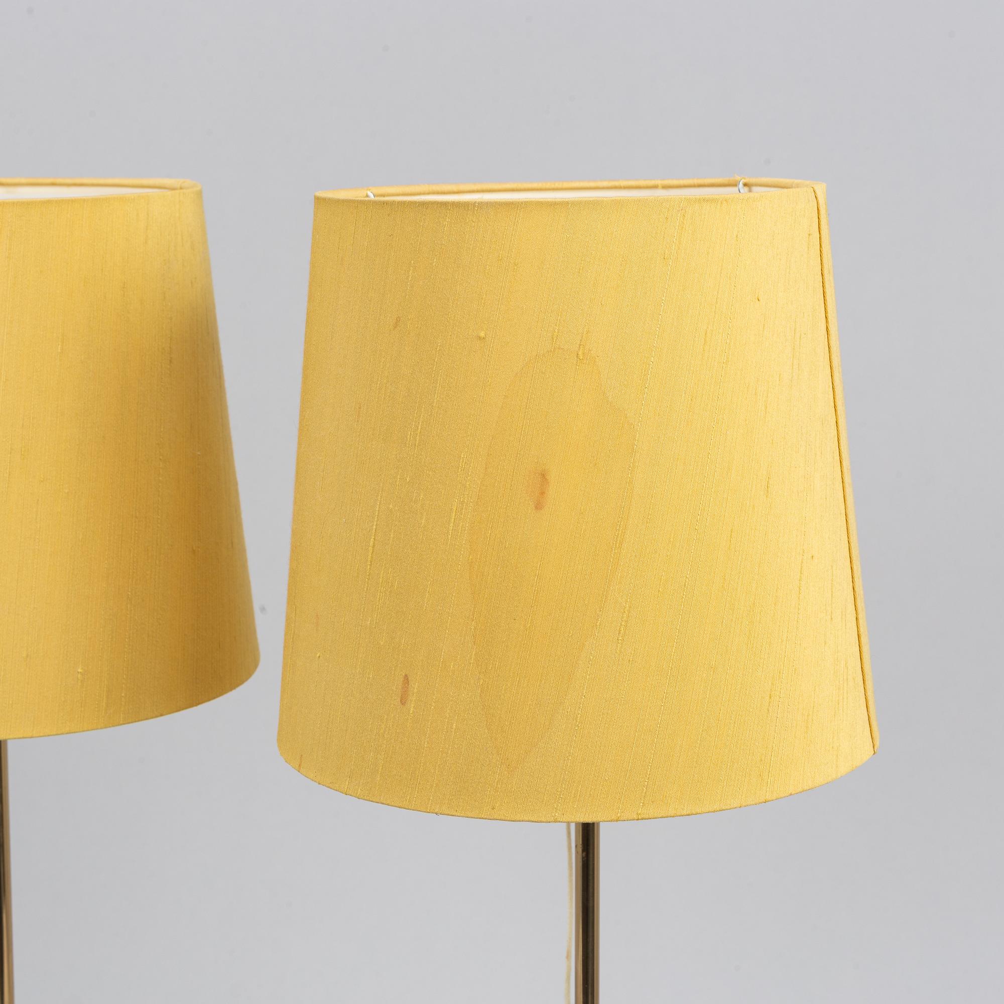 Apair of Bergbom brass table lamps.