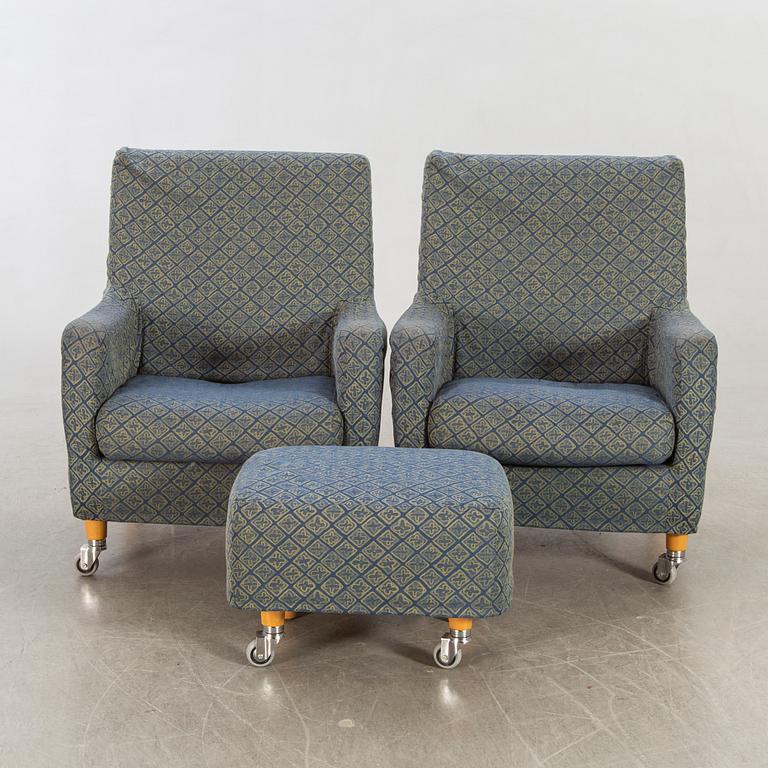 Erik Jörgensen,  a pair of armchairs and a stool, later part of the 20th century.