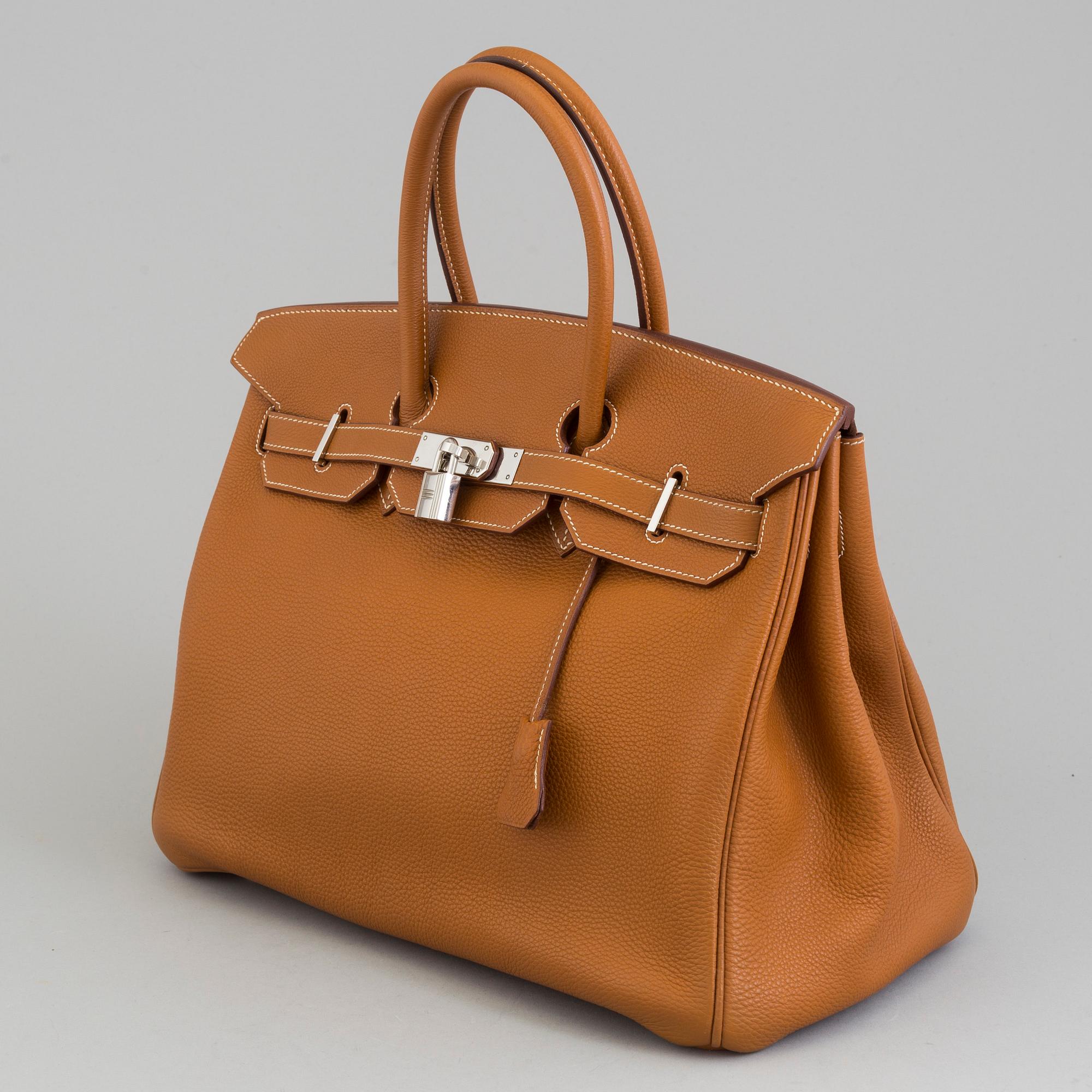 A gold togo Birkin 35 handbag by Hermès from 2004.