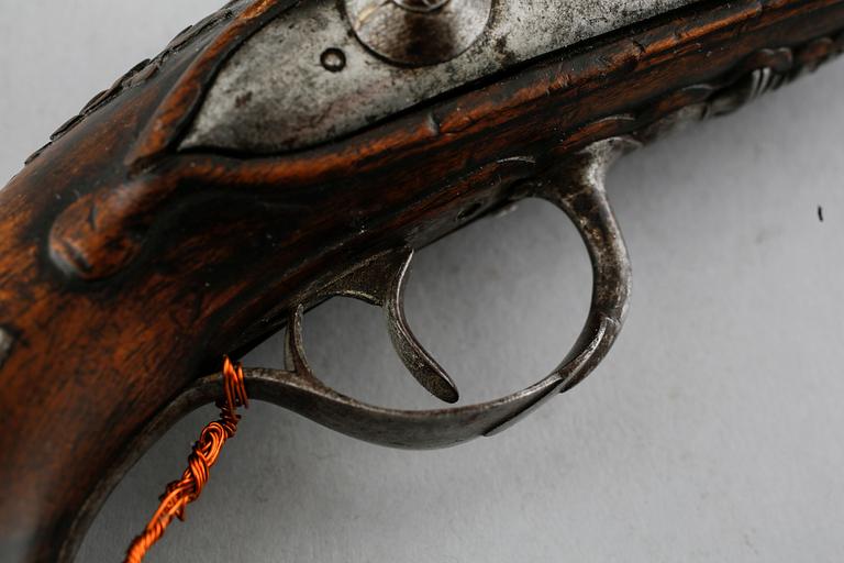 A flintlock gun, 18th century.
