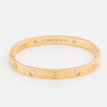 A Cartier bracelet "Love" in 18K gold set with round brilliant-cut diamonds.