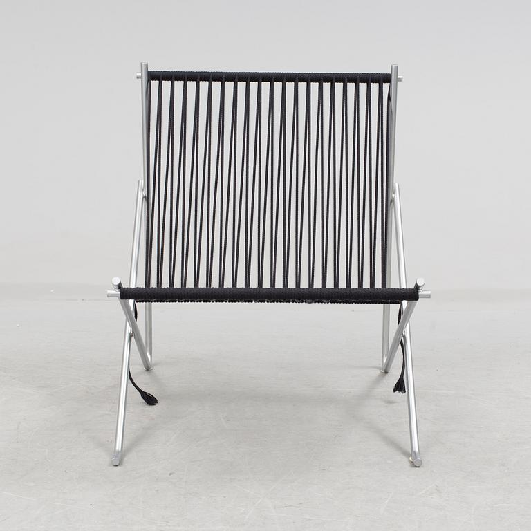 A "PK-4" chair by Poul Kjaerholm, Denmark.
