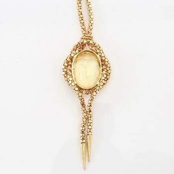 Necklace 18K gold with an oval faceted green synthetic spinel.
