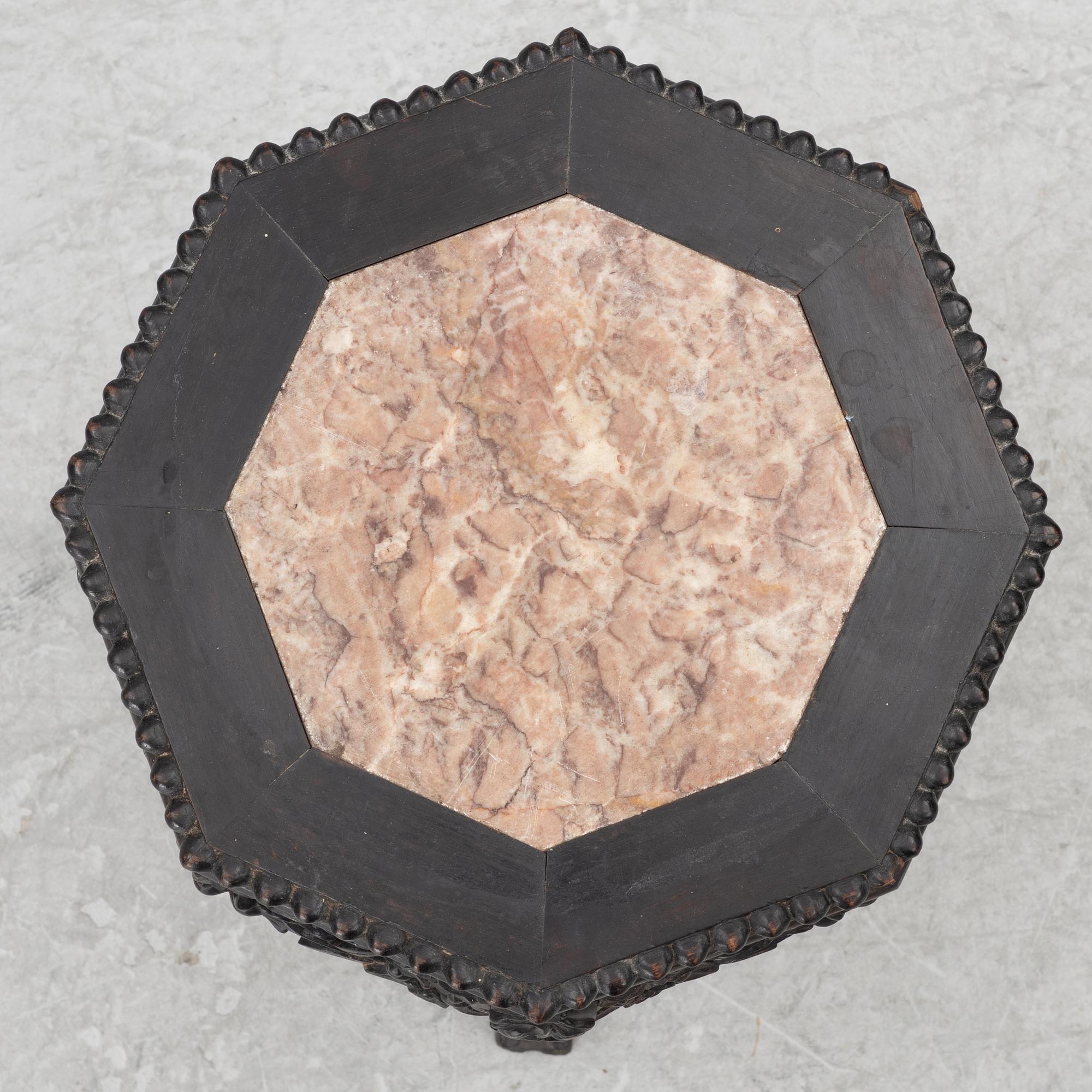 A Chinese small table, carved wood and stone, 1900s.