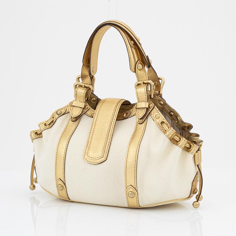 Louis Vuitton, a white canvas and gold 'Theda PM' bag, 2004.