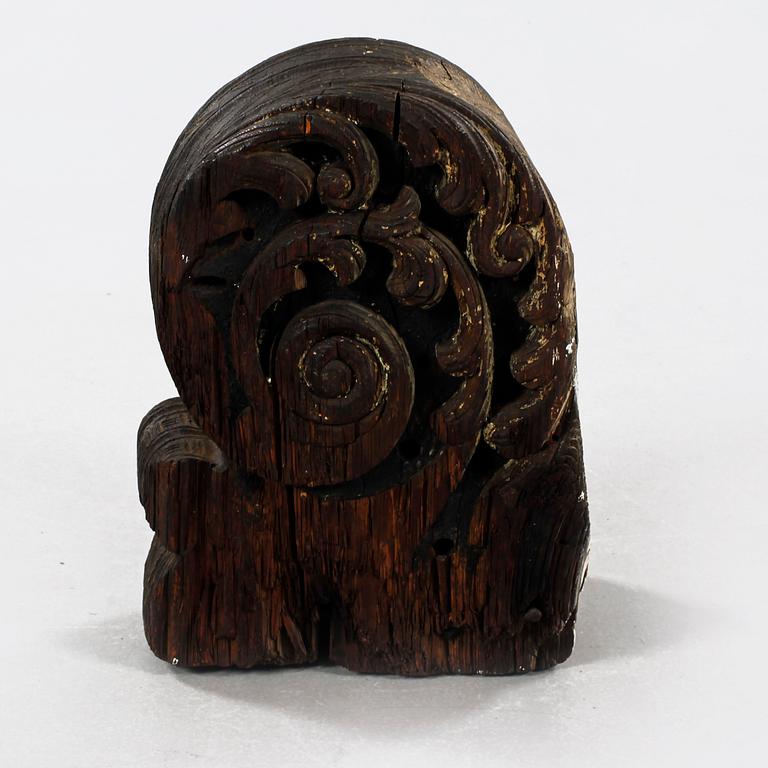 A 19th century wooden ship ornament.