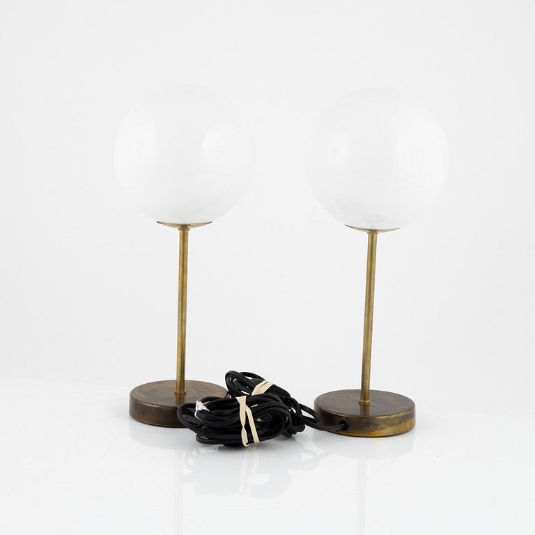 A pair of brass and glass table lights, second half of the 20th Century.