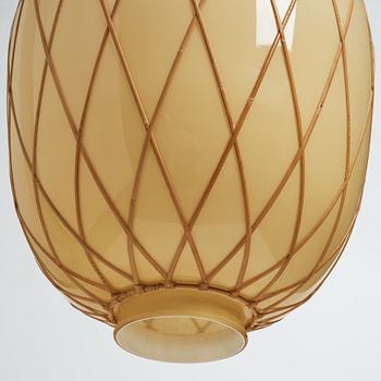 A pair of Swedish Modern vanilla coloured glass ceiling lights with fretted rattan, 1930-40's.