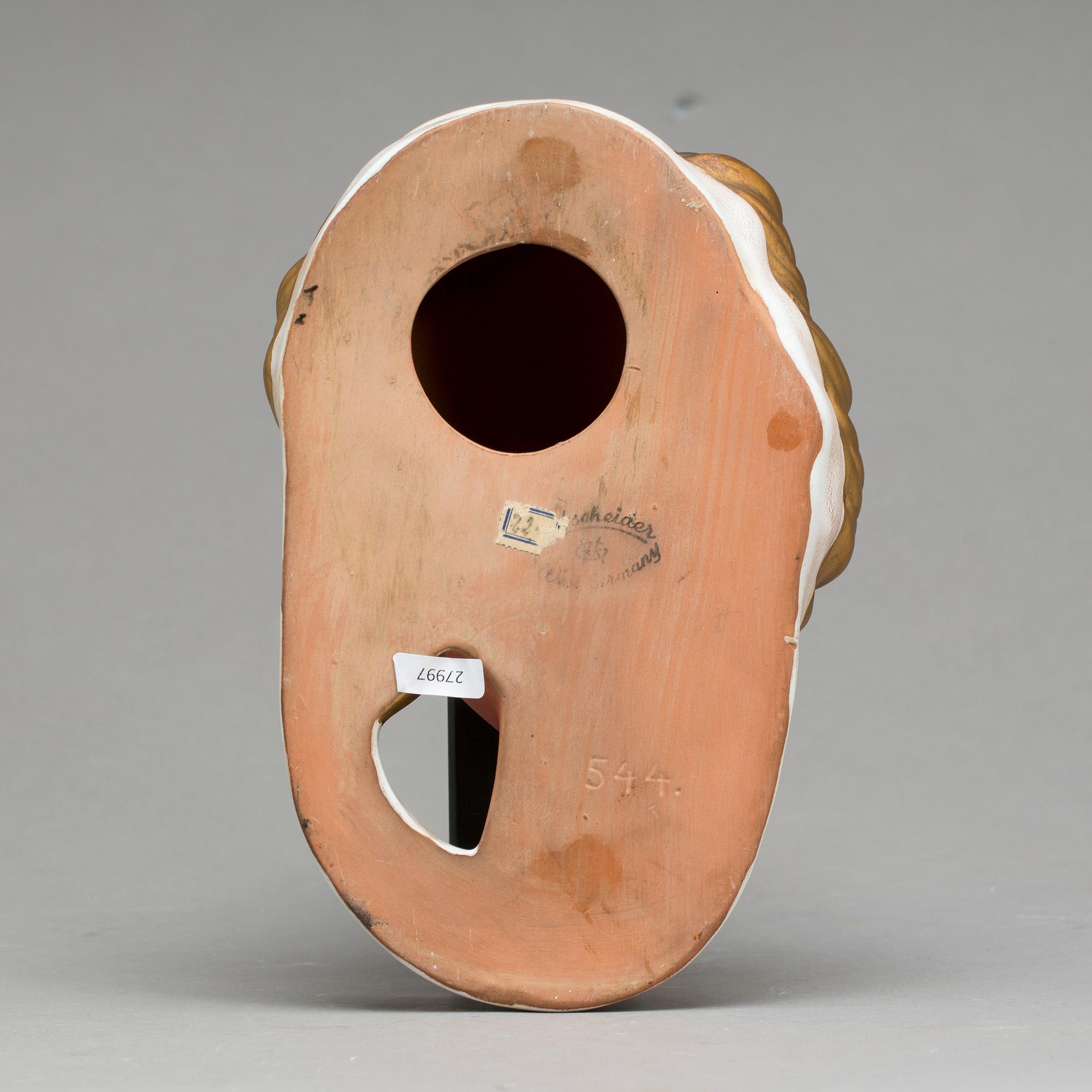 An Adolf Prischl terracotta wall mask for Goldscheider, mid 1900.