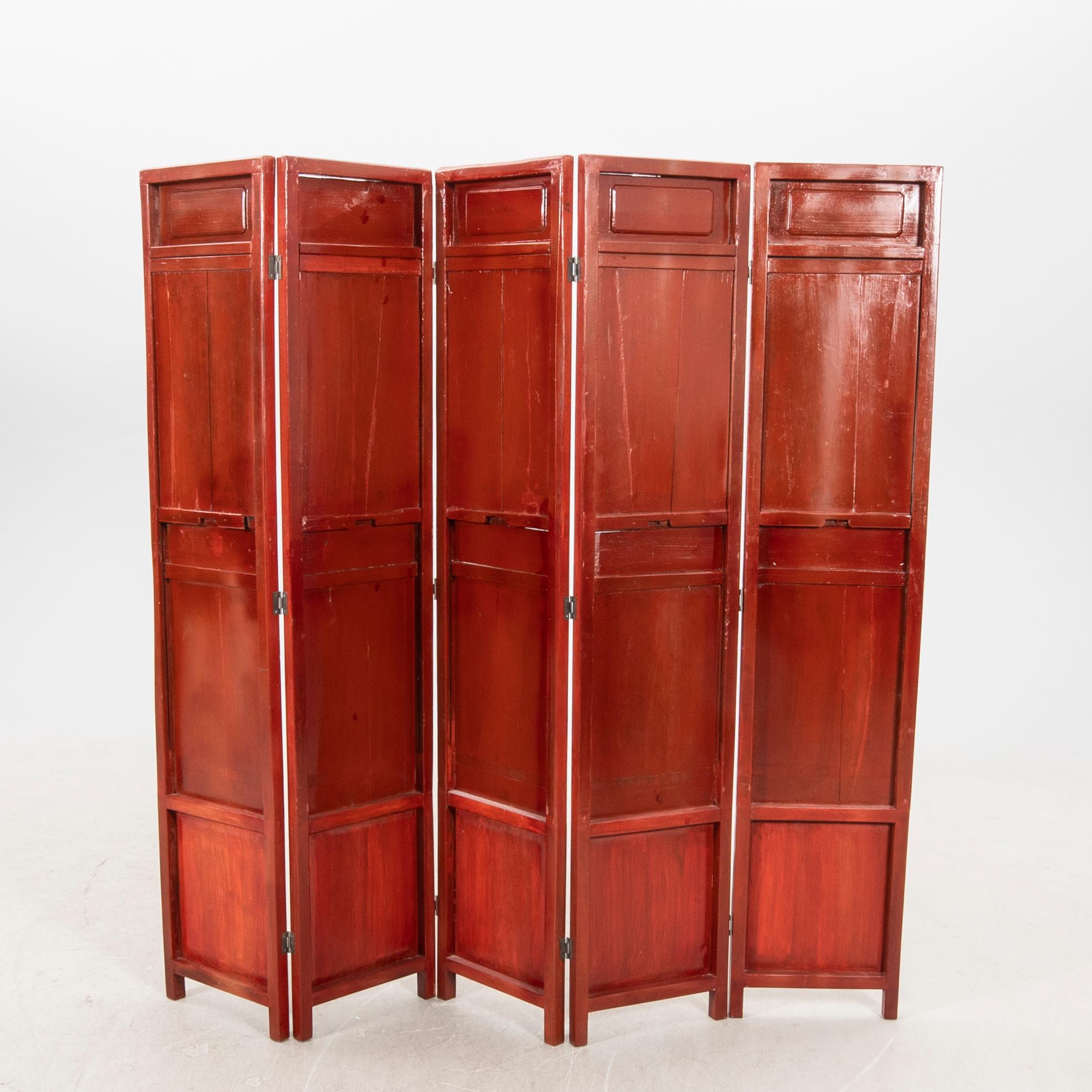 A painted wooden folding screen Asia 20th century.