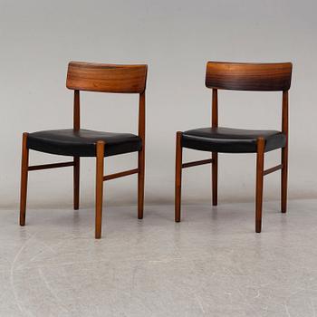 A 1950's/60's rosewood dinner table with four chairs, Denmark.