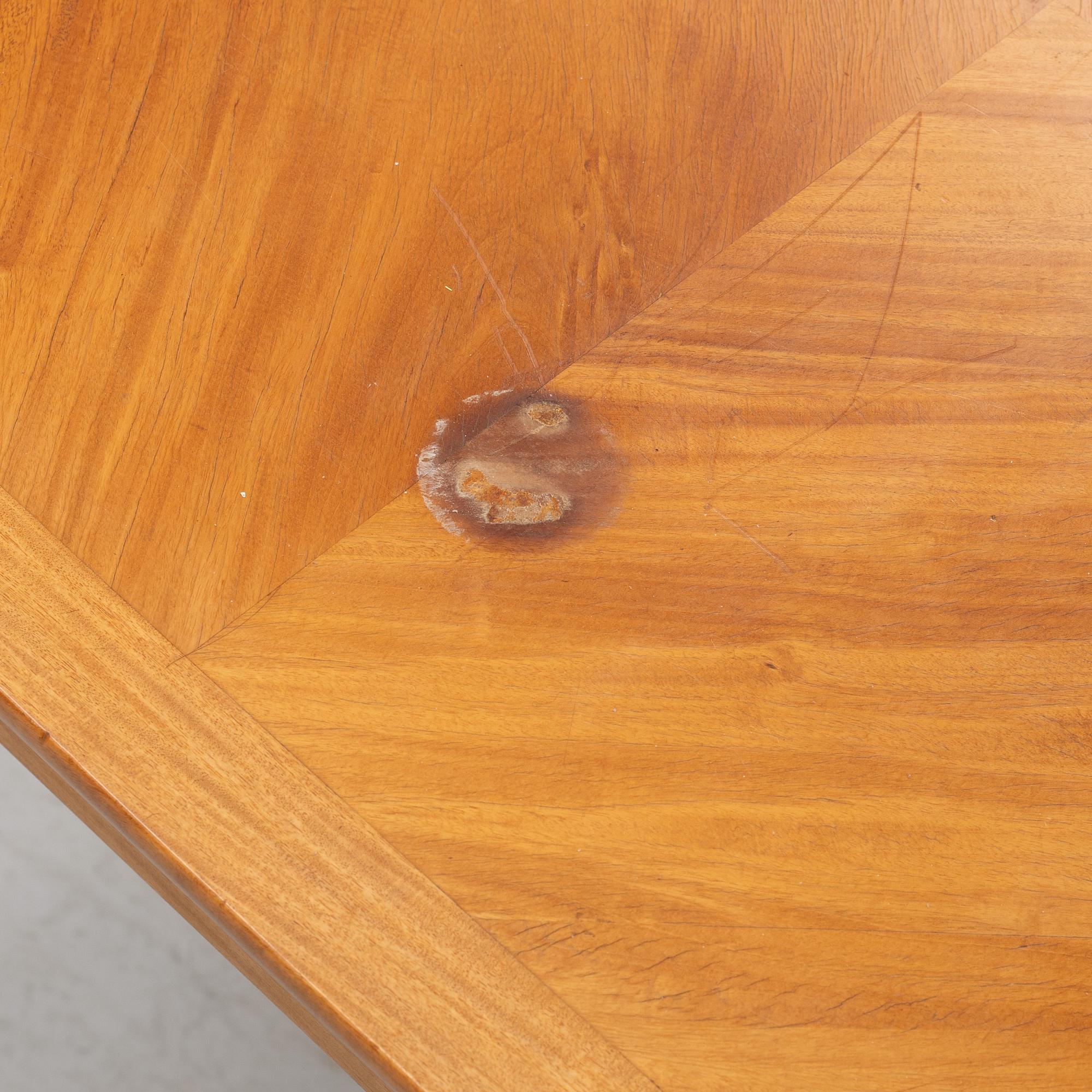 A mahogany veneered writing desk, 20th Century.