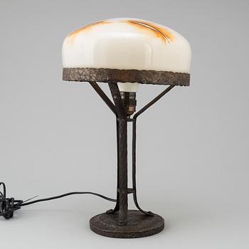 A wrought iron table light, early 20th Century.