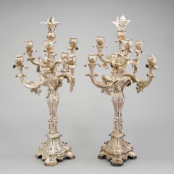 A pair of Neo-Rococo silver candelabra by Gustaf Möllenborg, Stockholm, 1845. Total weight ca 5920 grams.