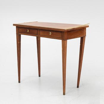 A late Gustavian style mahogany table with drawers.
