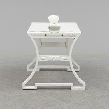A "Sneckan" bench by Folke Bensow for Byarums bruk in the late 20th century.
