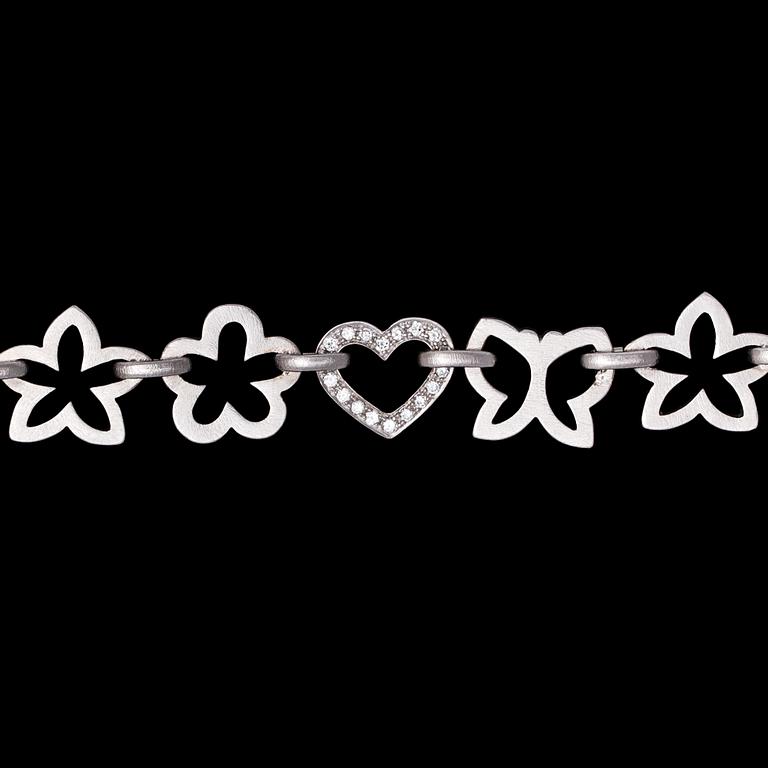 ARMBAND, Ole Lyngaard, vitguld med briljantslipade diamanter, tot. 0.18 ct.