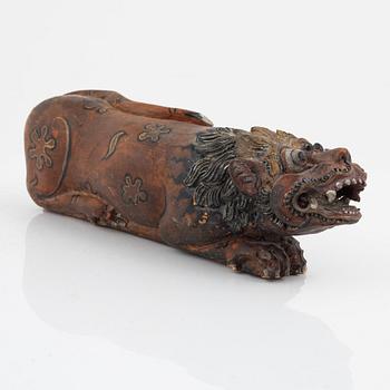 A wooden sculpture, South East Asia, 20th Century.
