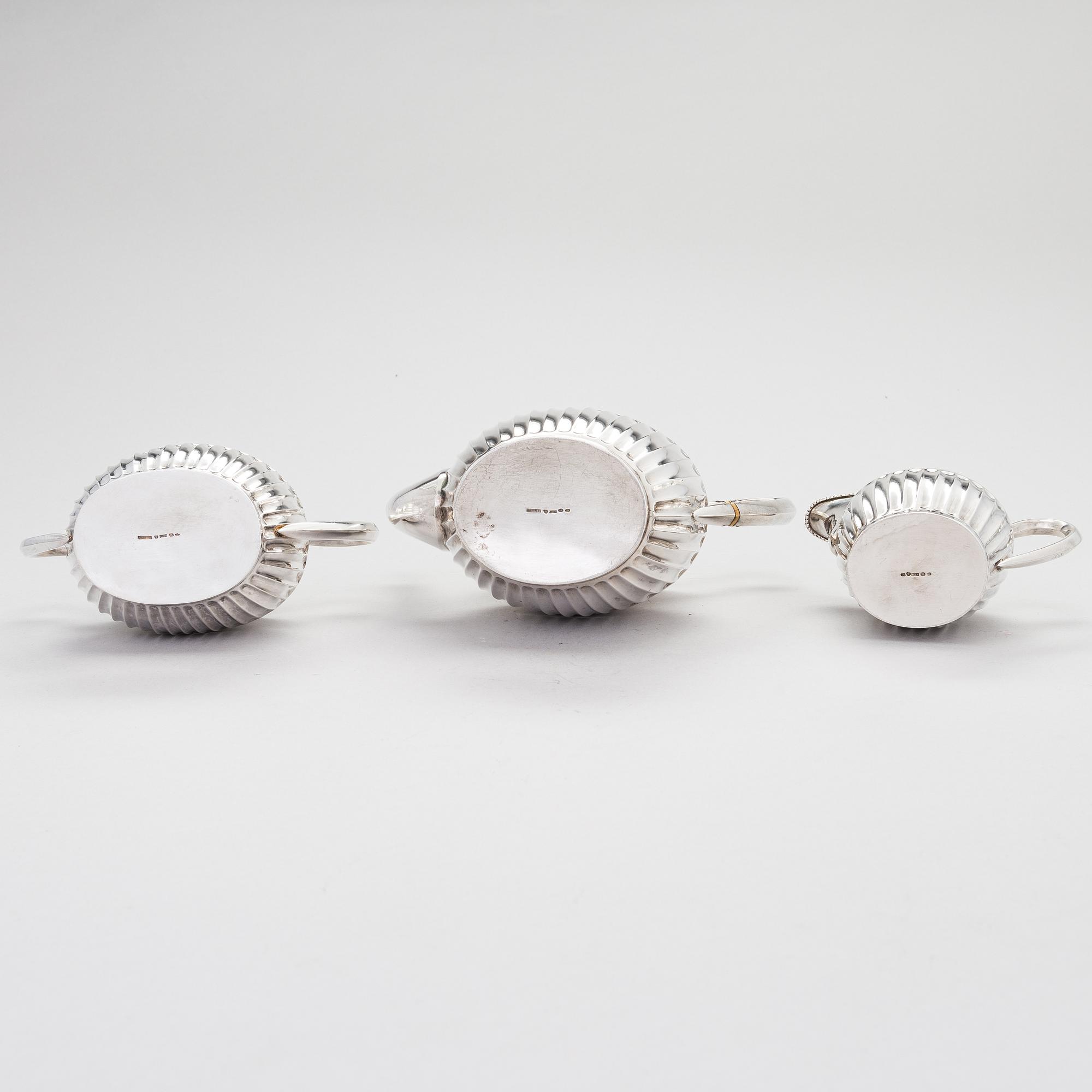 A three-piece gadrooned silver coffee set, Helsinki and Turku 1911 and 1914.