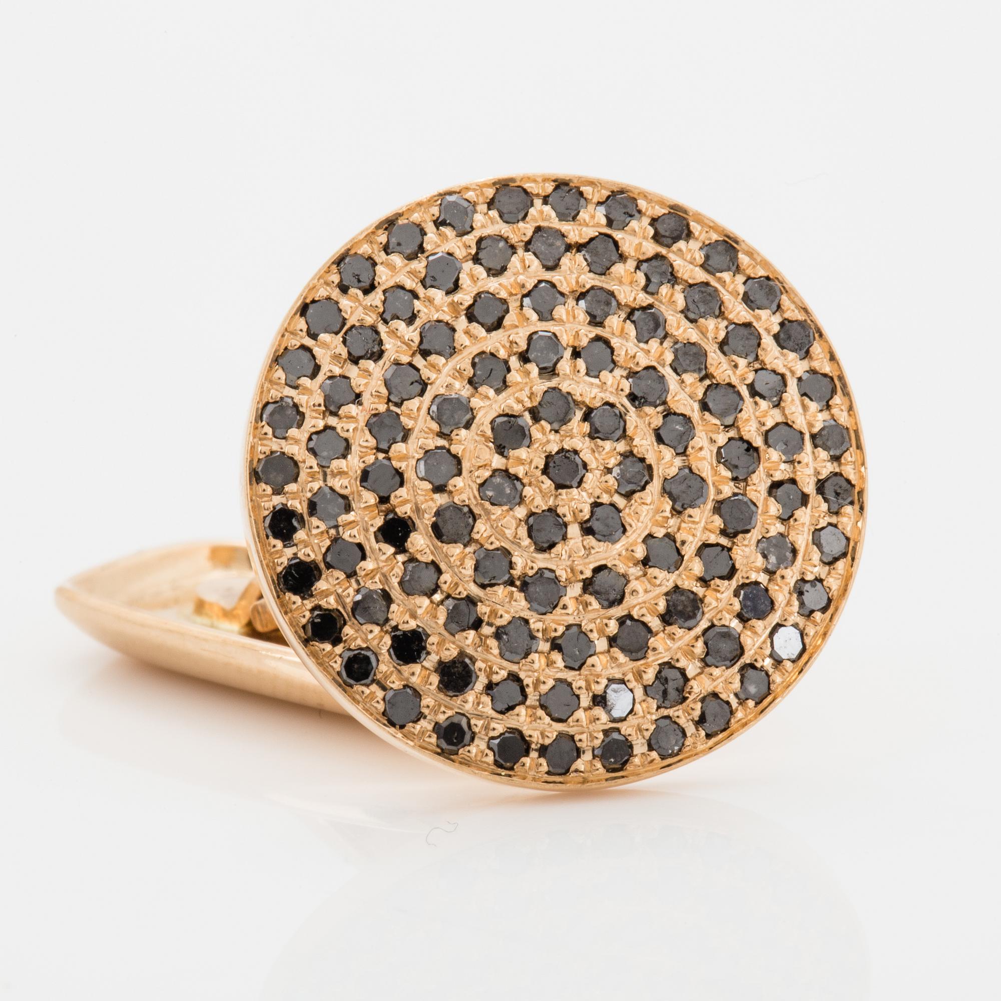 18K gold and black diamond cufflinks.